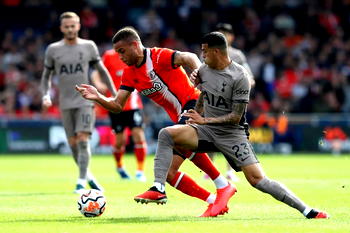 Ten-man Spurs top Premier League as Van de Ven sinks Luton