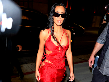 Photos: Kim Kardashian sparkles in fiery red dress for her star-studded 43rd birthday party