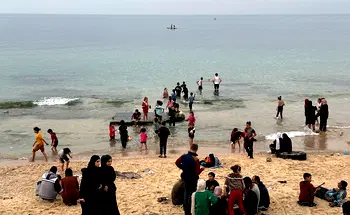 Tears, laughter on Gaza beach as children get break from war