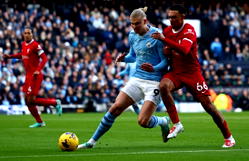 Liverpool face wounded Man City as Premier League title race heats up