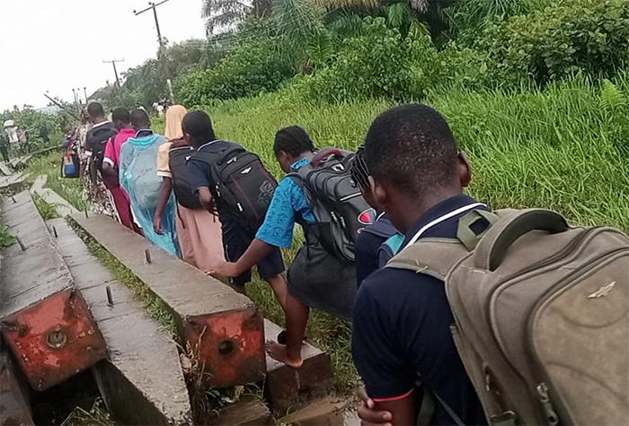 Okeogbe Community: How abandoned Lagos road makes students pass through 'hell' to school