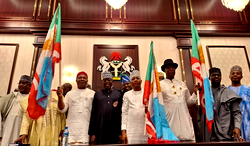 Tinubu presents APC flags to Uzodinma, Sylva, Ododo