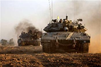 Israel sends dozens of tanks into southern Gaza