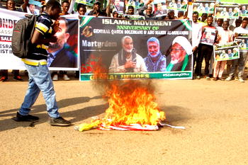 Shi’ites burn US, Israeli flags in Abuja over alleged killing of ‘martyrs’