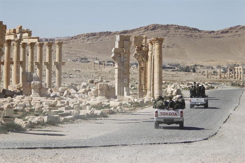 Islamic State group kills 14 Syrian soldiers 