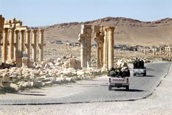 Islamic State group kills 14 Syrian soldiers 