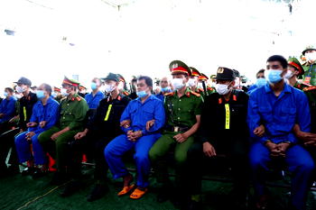 Vietnam tries 100 people for terrorism after gun attacks