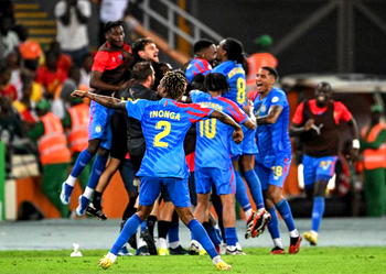 Former West Ham United defender Arthur Masuaku scored a vital goal as the Democratic Republic of Congo defeated Guinea 3-1 on Friday to reach the Africa Cup of Nations semi-finals.