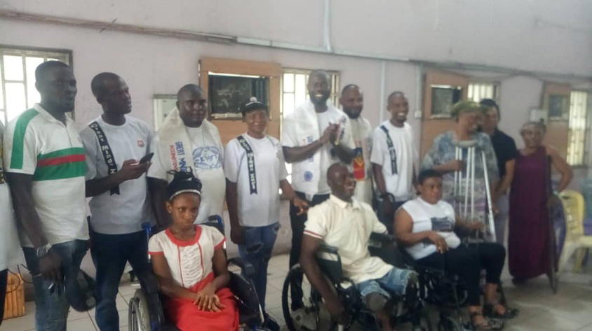 Valentine: Delta youth group distributes wheelchairs, clutches to physically-challenged