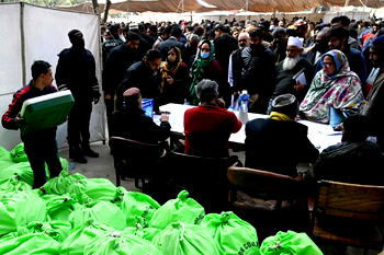 22 killed, 37 wounded in twin blasts on eve of Pakistan election
