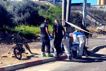 Teenager on bicycle stabs two Israelis at West Bank checkpoint