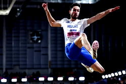 Tentoglou retains indoor long jump title, Holloway cruises