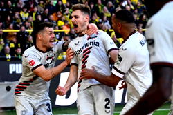 Bayer Leverkusen stay unbeaten with last-gasp strike at Dortmund