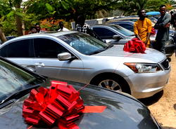 Nigerian clergyman empowers members with cars