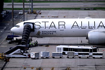 Relieved travellers land in Singapore after deadly turbulence