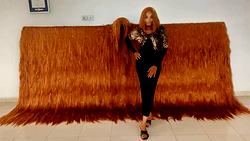 Nigerian lady breaks 3rd Guinness World Record with ‘wildest wig’