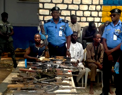 Updated: Police parade alleged Kaduna-Abuja train attack mastermind, recover 48 AK-47s