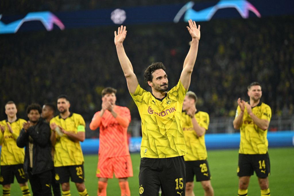 Dortmund set up Barcelona clash after beating Lille