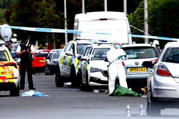 UK police question teen held after deadly mass stabbings