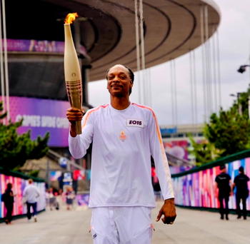Snoop Dogg stars as flame sails into Paris for opening ceremony