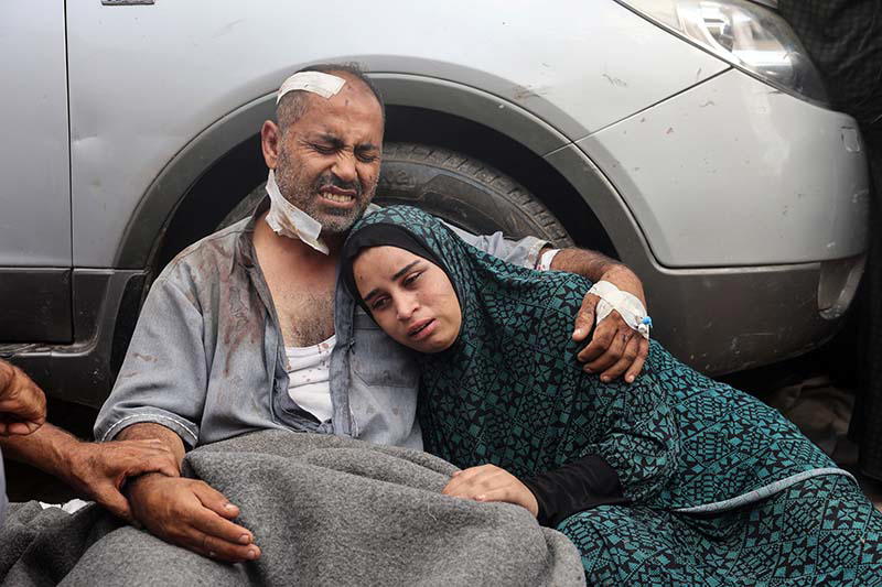 Body parts on rubble, as Israel's strikes kill 93 in Gaza school