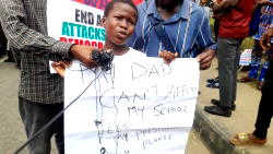 Photos: Little protester writes Tinubu to pay her school fees