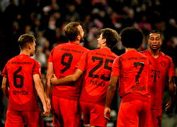 Kane hat-trick sends Bayern top past Leipzig