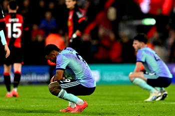 Ten-man Arsenal stunned by Bournemouth
