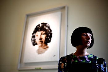 Portrait by humanoid robot to sell at auction in art world first