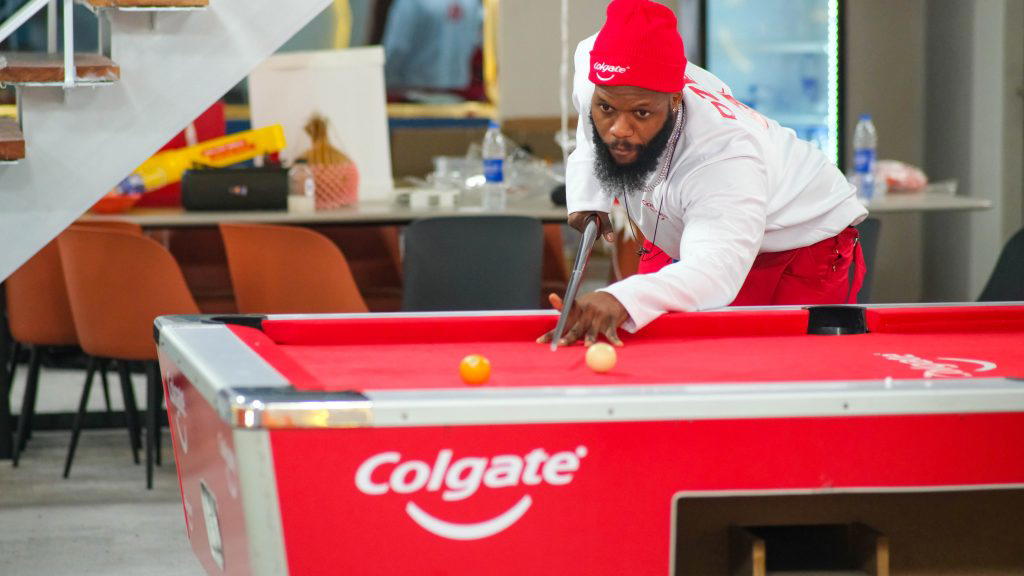 Colgate’s Masterstroke on Big Brother Naija 2024
When Colgate stepped into the Big Brother Naija house for the first time this season, the brand didn’t just bring toothpaste, it brought innovation, creativity, and a fresh take on how oral hygiene education can be delivered to Nigerians.
As a premium toothpaste brand under the Tolaram Group, Colgate’s message of zero cavities, fresh breath and yanga smile was delivered seamlessly with the high-energy, entertainment-packed atmosphere of the Big Brother house. The "let’s have a talk" commercial that aired during ad breaks brilliantly drove realization of the importance of good oral care hygiene to viewers by using kids with gapped smiles to remind elders that missing teeth may be cute on kids because their teeth will grow back. However, as an adult if you don’t brush regularly, your tooth loss is permanent.
The commercial delivered the metaphor brilliantly and was as a result of the research carried out by the brand where it as discovered that 60% Nigerian above 35 years of age have lost a tooth or missing teeth due to poor oral hygiene as we have an attitude where we don’t fix things until they’re broken beyond use.
From the moment viewers tuned in on the show, Colgate’s presence in Big brother house was impossible to miss, a snooker board designed with Colgate’s logo and Yanga with your smile message stood proudly in the game room, while stools that looked like giant teeth were placed strategically for housemates to sit on. These eye-catching additions created playful reminders of oral hygiene throughout the house, making the brand’s presence both fun and functional. Beyond the visual branding, Colgate played a crucial role in maintaining the housemates’ oral hygiene in the house by providing a steady supply of its premium toothpaste of both Maximum cavity protection and Herbal variants with cameras rolling 24/7, none were caught with anything less than a dazzling smile.
Week six of the show brought Colgate’s brand to the forefront with a special task that showcased the importance of imbibing good oral hygiene habit using Colgate toothpaste and brush. Before the games, the housemates were given a box containing Colgate merchandise and cards containing oral care tips. They were to use the Colgate toothpaste to freshen up their smiles once more and then go through the oral care tips from the card.
The Housemates were then divided into pairs, embellishing the catchphrase from its TV commercial “Let’s Have a Talk” and of course the unique qualities of the Colgate brand, the teams were Team Strong Teeth, Team Zero Cavity, Team Fresh Breath, Team Yanga Smiles, Team Healthy Gum, Team Dental Checks, Team Gum Protection, Team Bright Smiles, and Team Calcium In.
The whole task was divided into three sections: the first was a question and answer game where the housemates’ knowledge was tested on different oral care and hygiene questions based on the tips shared earlier. The second was fixing a smile game and the third was an obstacle course game. For the question-and-answer game, one team member read out the questions while the other answered them, for every correct answer, the housemates earned 10 points, and every wrong answer earned them a 5-point reduction. Each team had three minutes to attempt 20 questions, viewers also dropped their own answers on social media while tagging the brands page.
The second game called fixing a Smile was a two-minute game aimed at testing the housemates’ communication skills and speed. The housemates were provided with a caricature face on a board. One pair of each team went behind the board to fix the smile with the cut of piece cardboard paper, while the other issuing guidance from the front of the board. The team that fixed the smile correctly within the time limit got 10 points.
The obstacle course which was the final game tasked the housemates to go through each street of the obstacle course together while carrying a life size giant toothbrush without dropping it. Each street had instructions and a score allocated to it. The street was labelled with names such as Fresh Breath Avenue, Gum Drive, Fresh Breath Avenue, Tongue Lane, and Jaw Street. The housemates then collected Colgate toothpaste from a machine and brushed the teeth of an image with germs, stepping aside for their time to be recorded.
Reviews and highlights of the task went on social media platforms where viewers were showing support for their favs and at the end, Team Fresh Breath featuring Sooj and Chizoba were the oral care champions in the house as they won the task. Conversations about the task didn't end that day as #BBNColgatetask started trending a day after the task on X as viewers dropped their favorite moments of the task the previous day thereby cementing the fact that Colgate had succeeded in creating a task that was both educative, fun, and entertaining.
For housemates and viewers alike, fresh breath and yanga smiles are the new norm, thanks to Colgate’s brilliant sponsorship debut.