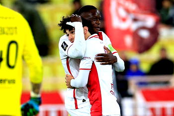Monaco down 10-men Brest to cut PSG lead
