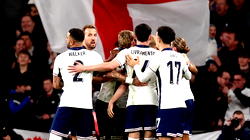 England secure Nations League promotion as Haaland inspires Norway
