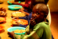 Hunger: Children scavenge for leftovers at parties, prayer houses