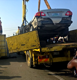 Driver escapes death as 40ft container falls on car