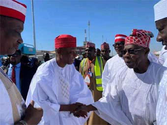 Obasanjo attends Kwankwaso’s daughter’s wedding in red cap