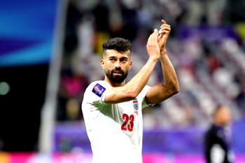 Iran football federation summons player for hugging female fan