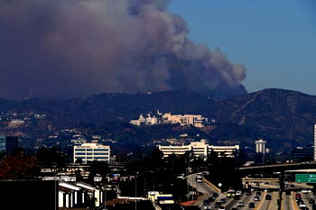 LA fires expand as winds forecast to pick up