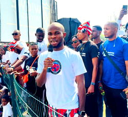 Harry Excellent Amadi Awards Scholarships, Supports Kids at Isiokpo Carnival 2024