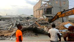 Photos: Seven injured as three-storey building collapses in Rivers