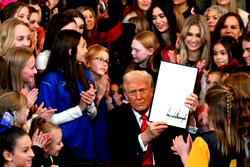 Trump signs order barring trans athletes from women’s sports