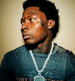 Asake finally speaks on face tattoos