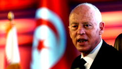 Tunisia president fires finance minister