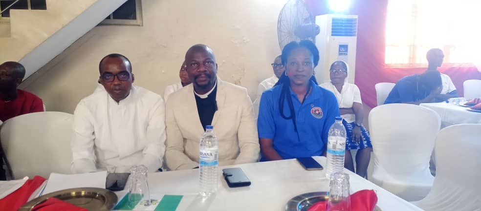 From R-L. Mrs. Lucy Adetuwo-Olaniyi, Rev Father, Oluwafemi Orilua, and a guest on the occasion