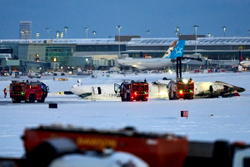 Delta passengers dangled from seats as plane flipped over