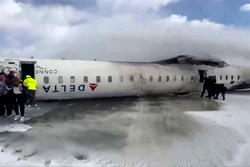 Delta plane flips upside down in Toronto crash, eight wounded