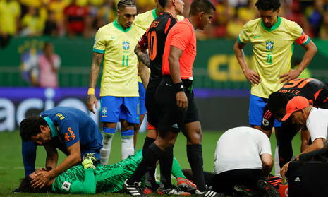 Liverpool’s Alisson returns early from Brazil duty with suspected concussion