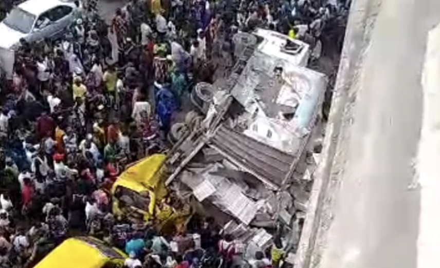 Truck plunges off bridge in Lagos, lands on 2 commercial buses