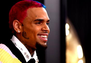 Chris Brown to appear in court after charged with assault in Britain