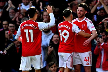 Arsenal sink Newcastle to seal Champions League spot