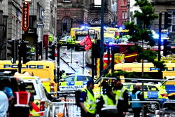 Football unites after car ploughs into Liverpool victory parade